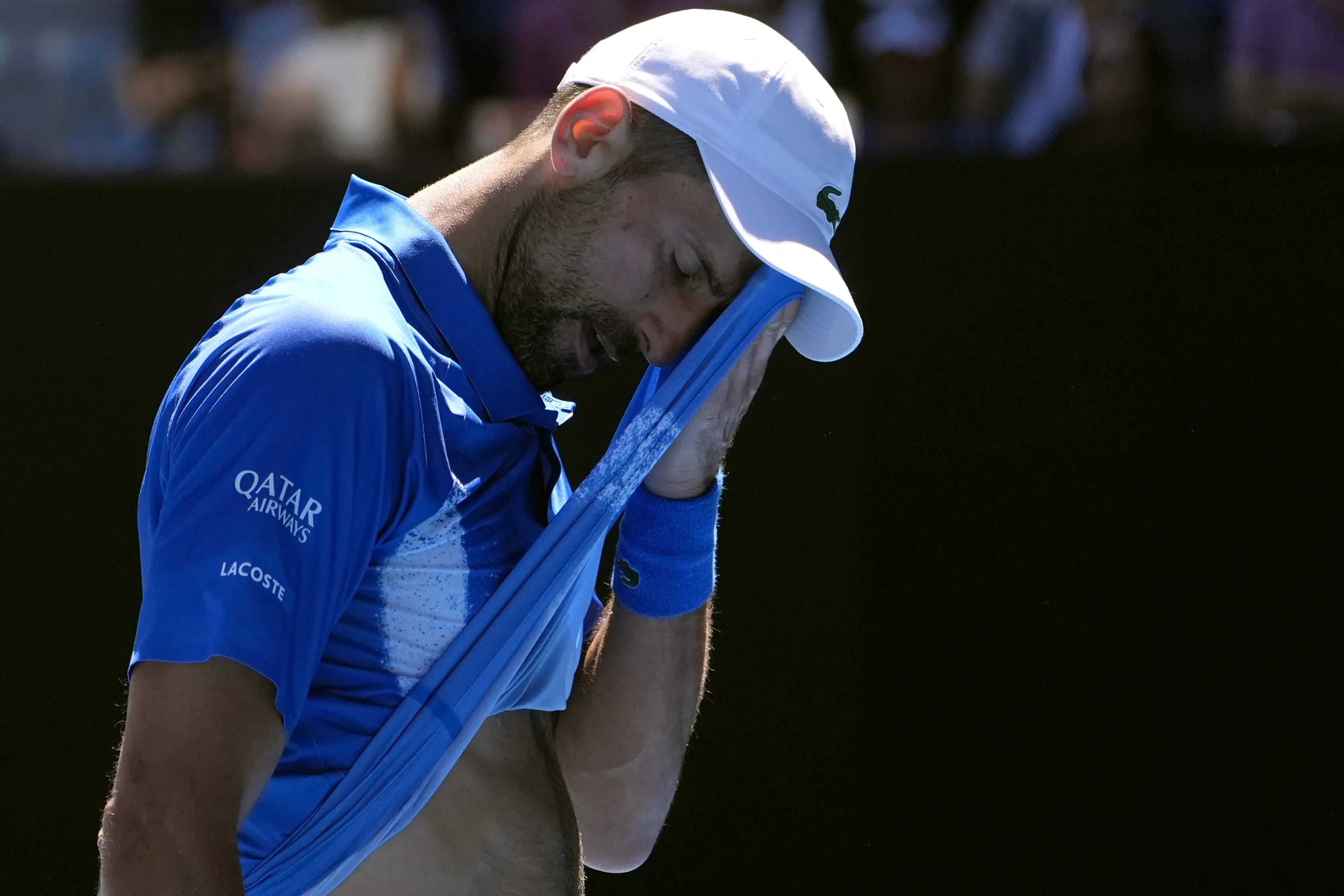 Novak Djokovic retires injured from Australian Open semifinal, as some fans  boo - OPB
