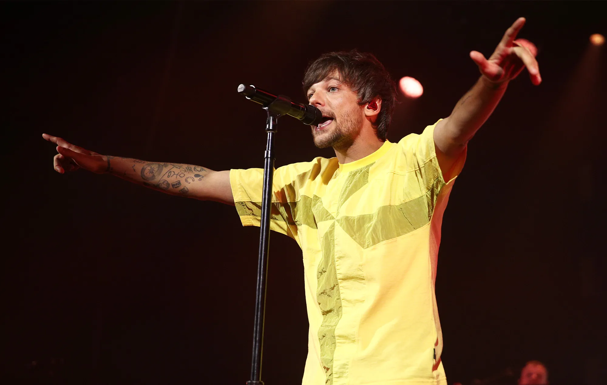 Louis Tomlinson shares hot take on One Direction: “The first album was shit”