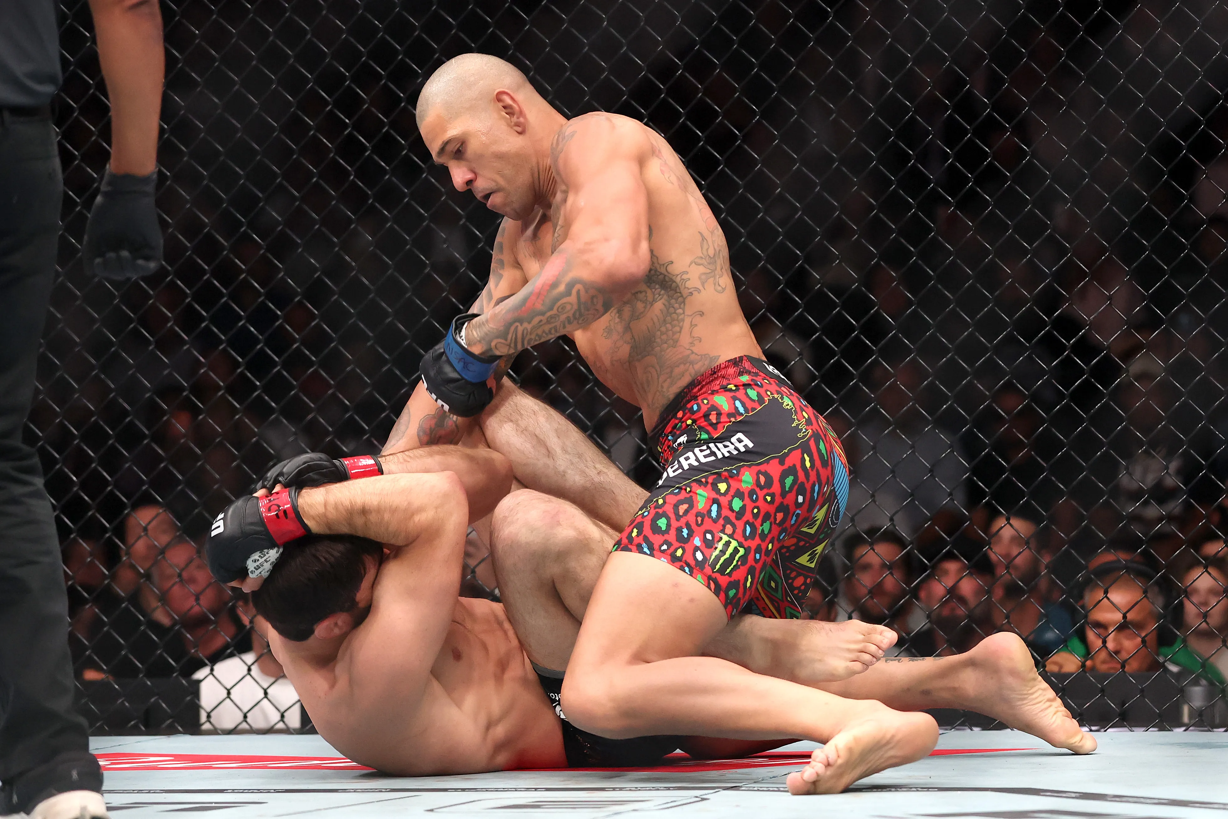 Alex Pereira walks through Magomed Ankalaev in just 80 seconds to reclaim  title in UFC 320 main event | MMA Fighting