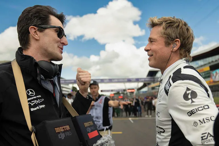 Warner Bros Pictures / Apple Original Films (L-R): Director Joseph Kosinski and Brad Pitt on the set of "F1."