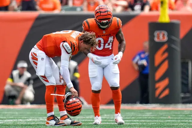 Joe Burrow back with Bengals three days after surgery, with rolling  scooter, foot in cast - Yahoo Sports