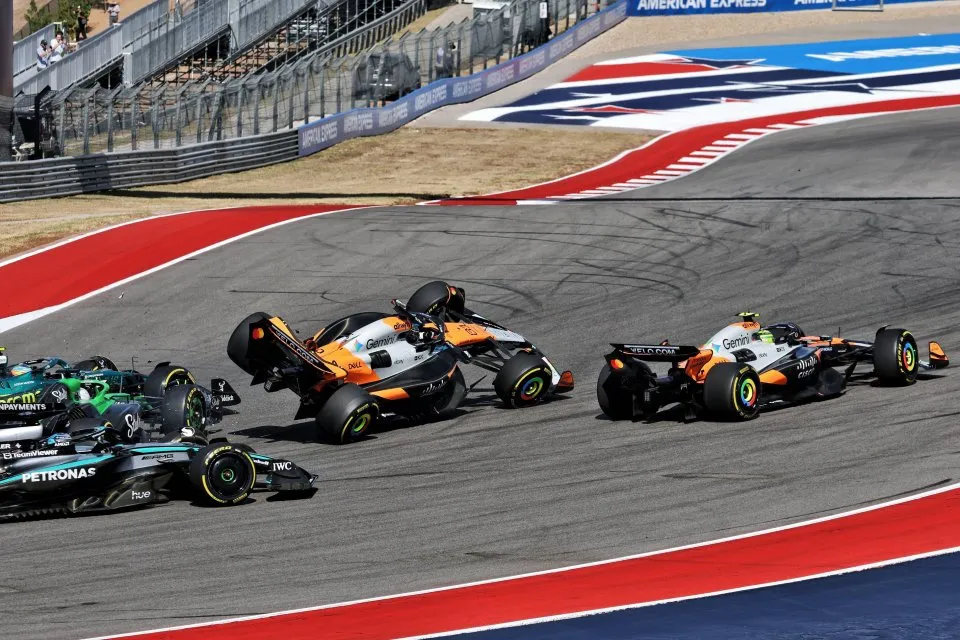 Lando Norris and Oscar Piastri involved in multi-car collision in opening  corner with McLaren duo forced to retire