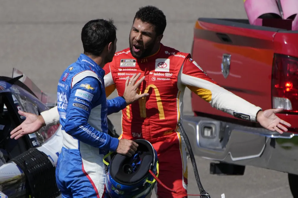 Bubba Wallace puts aside 'Peace. Love. Understanding' in battle with Kyle  Larson