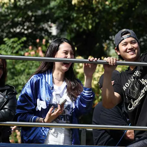 Shohei Ohtani shows wife Mamiko rare public affection during World Series parade